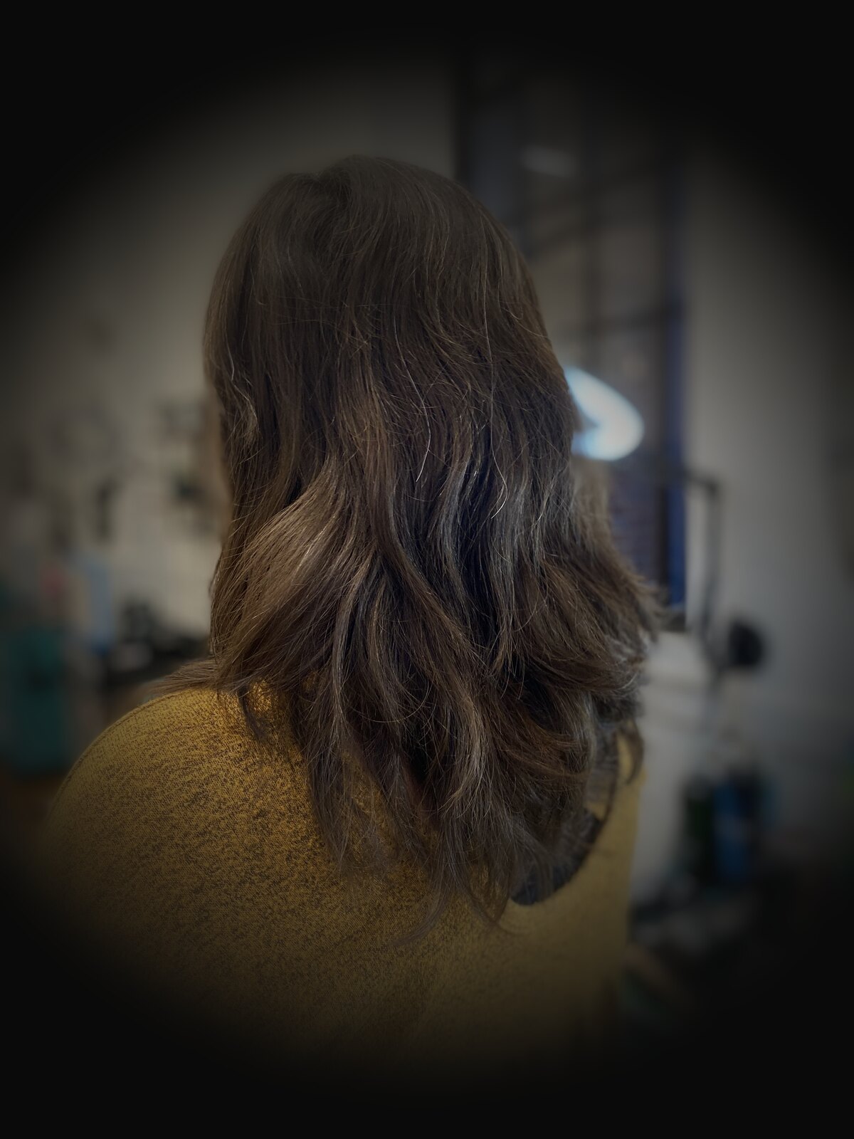 Women's long layered cut and color
